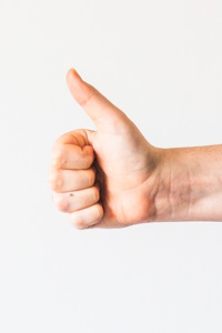 hand giving a thumbs up